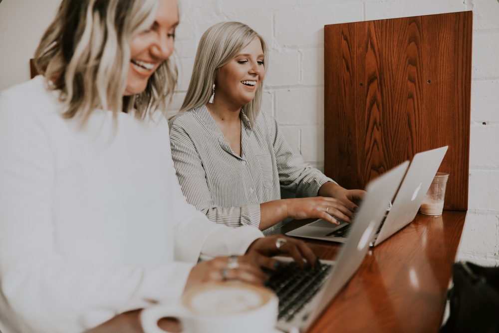 ladies working on their laptops